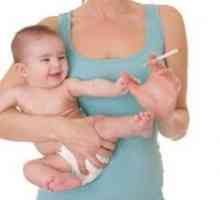 Tabák kojící dítě