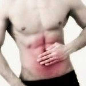 Příznaky žaludečního vředu: pálení žáhy, nevolnost a zvracení